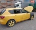 Желтый Мазда 3, объемом двигателя 2 л и пробегом 330 тыс. км за 2800 $, фото 5 на Automoto.ua