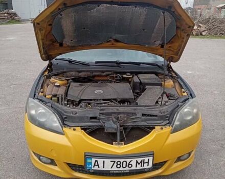 Желтый Мазда 3, объемом двигателя 2 л и пробегом 330 тыс. км за 2800 $, фото 13 на Automoto.ua
