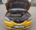 Желтый Мазда 3, объемом двигателя 2 л и пробегом 330 тыс. км за 2800 $, фото 13 на Automoto.ua