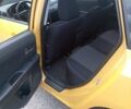 Желтый Мазда 3, объемом двигателя 2 л и пробегом 330 тыс. км за 2800 $, фото 9 на Automoto.ua