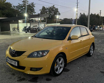 Желтый Мазда 3, объемом двигателя 1.6 л и пробегом 200 тыс. км за 2900 $, фото 1 на Automoto.ua