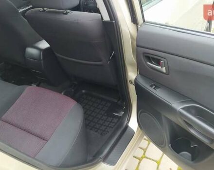 Жовтий Мазда 3, об'ємом двигуна 1.56 л та пробігом 191 тис. км за 2950 $, фото 17 на Automoto.ua