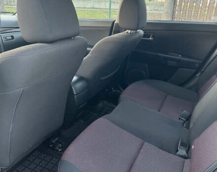 Жовтий Мазда 3, об'ємом двигуна 1.56 л та пробігом 190 тис. км за 3399 $, фото 9 на Automoto.ua