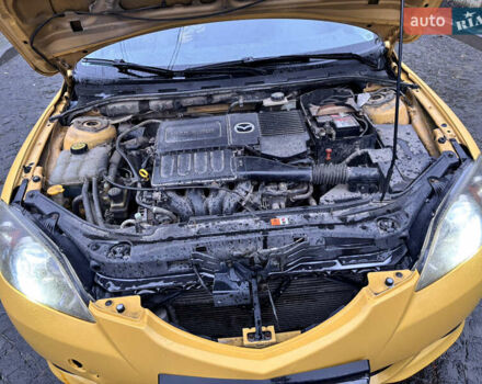 Желтый Мазда 3, объемом двигателя 1.6 л и пробегом 200 тыс. км за 3400 $, фото 16 на Automoto.ua