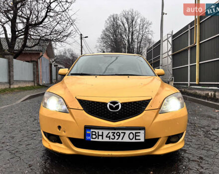 Желтый Мазда 3, объемом двигателя 1.6 л и пробегом 200 тыс. км за 3400 $, фото 1 на Automoto.ua