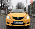 Желтый Мазда 3, объемом двигателя 1.6 л и пробегом 200 тыс. км за 3400 $, фото 1 на Automoto.ua