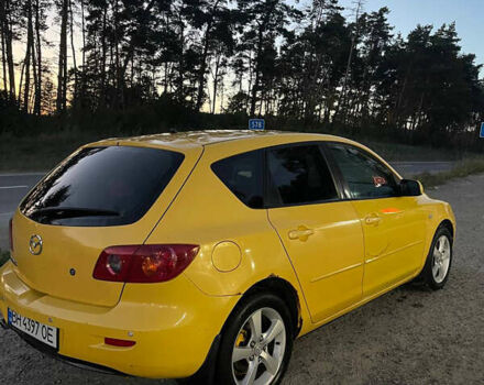 Желтый Мазда 3, объемом двигателя 1.6 л и пробегом 200 тыс. км за 2900 $, фото 4 на Automoto.ua