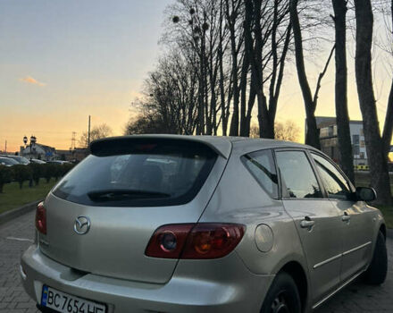 Жовтий Мазда 3, об'ємом двигуна 1.56 л та пробігом 190 тис. км за 3399 $, фото 4 на Automoto.ua