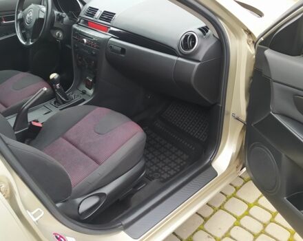 Желтый Мазда 3, объемом двигателя 1.6 л и пробегом 191 тыс. км за 2950 $, фото 17 на Automoto.ua