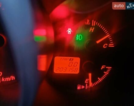Желтый Мазда 3, объемом двигателя 1.6 л и пробегом 205 тыс. км за 5550 $, фото 10 на Automoto.ua