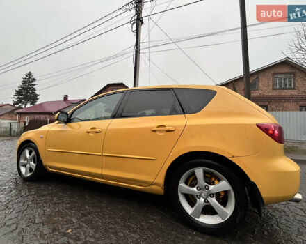 Желтый Мазда 3, объемом двигателя 1.6 л и пробегом 200 тыс. км за 3400 $, фото 4 на Automoto.ua