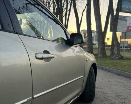 Жовтий Мазда 3, об'ємом двигуна 1.56 л та пробігом 190 тис. км за 3399 $, фото 6 на Automoto.ua