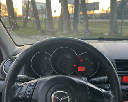 Жовтий Мазда 3, об'ємом двигуна 1.56 л та пробігом 190 тис. км за 3399 $, фото 11 на Automoto.ua