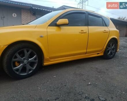 Желтый Мазда 3, объемом двигателя 1.6 л и пробегом 205 тыс. км за 5550 $, фото 4 на Automoto.ua