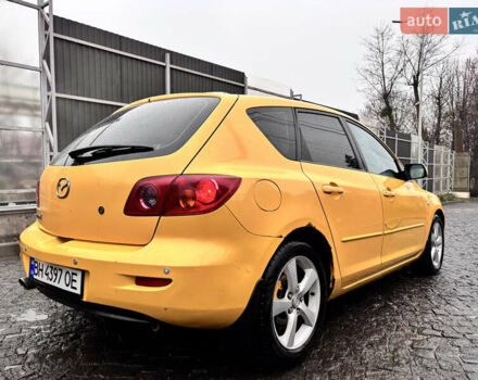 Желтый Мазда 3, объемом двигателя 1.6 л и пробегом 200 тыс. км за 3400 $, фото 6 на Automoto.ua