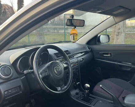 Жовтий Мазда 3, об'ємом двигуна 1.56 л та пробігом 190 тис. км за 3399 $, фото 8 на Automoto.ua