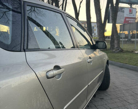 Жовтий Мазда 3, об'ємом двигуна 1.56 л та пробігом 190 тис. км за 3399 $, фото 5 на Automoto.ua