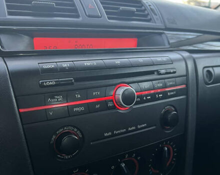 Жовтий Мазда 3, об'ємом двигуна 1.56 л та пробігом 190 тис. км за 3399 $, фото 13 на Automoto.ua