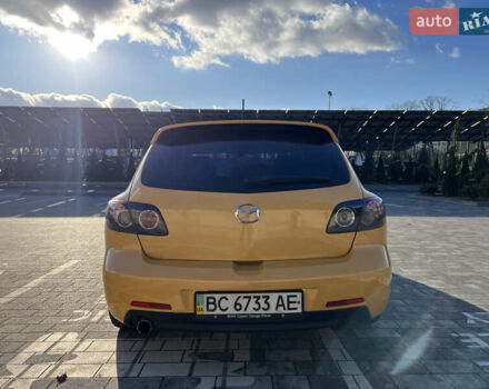 Желтый Мазда 3, объемом двигателя 2 л и пробегом 195 тыс. км за 6400 $, фото 7 на Automoto.ua