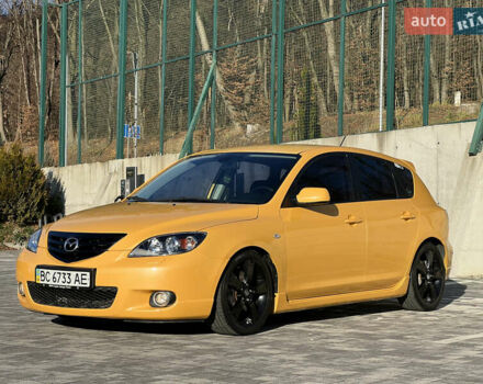 Желтый Мазда 3, объемом двигателя 2 л и пробегом 195 тыс. км за 6400 $, фото 2 на Automoto.ua