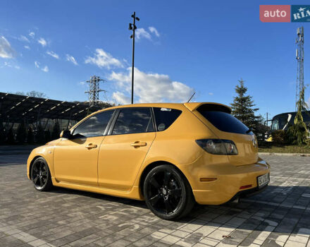 Желтый Мазда 3, объемом двигателя 2 л и пробегом 195 тыс. км за 6400 $, фото 6 на Automoto.ua