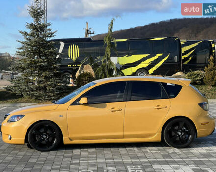 Желтый Мазда 3, объемом двигателя 2 л и пробегом 195 тыс. км за 6400 $, фото 5 на Automoto.ua