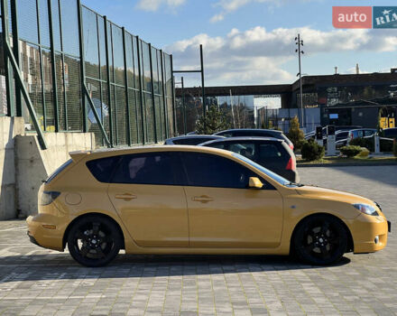 Желтый Мазда 3, объемом двигателя 2 л и пробегом 195 тыс. км за 6400 $, фото 4 на Automoto.ua