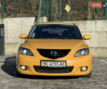 Желтый Мазда 3, объемом двигателя 2 л и пробегом 195 тыс. км за 6400 $, фото 1 на Automoto.ua