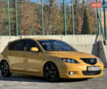 Желтый Мазда 3, объемом двигателя 2 л и пробегом 195 тыс. км за 6400 $, фото 3 на Automoto.ua