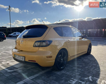 Желтый Мазда 3, объемом двигателя 2 л и пробегом 195 тыс. км за 6400 $, фото 8 на Automoto.ua