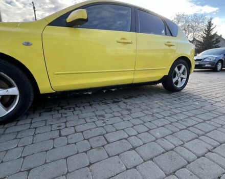 Жовтий Мазда 3, об'ємом двигуна 1.6 л та пробігом 206 тис. км за 4190 $, фото 8 на Automoto.ua