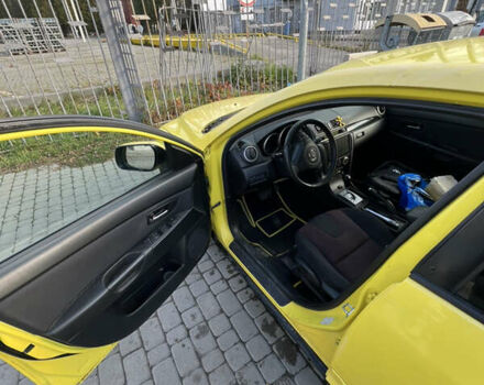 Жовтий Мазда 3, об'ємом двигуна 1.6 л та пробігом 206 тис. км за 4190 $, фото 9 на Automoto.ua