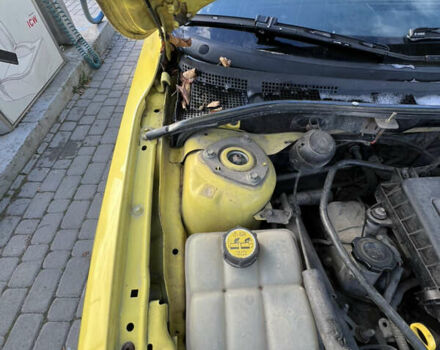 Жовтий Мазда 3, об'ємом двигуна 1.6 л та пробігом 206 тис. км за 4190 $, фото 20 на Automoto.ua