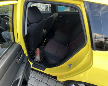 Жовтий Мазда 3, об'ємом двигуна 1.6 л та пробігом 206 тис. км за 4190 $, фото 11 на Automoto.ua