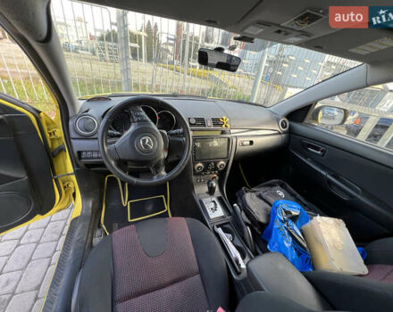 Жовтий Мазда 3, об'ємом двигуна 1.6 л та пробігом 206 тис. км за 4190 $, фото 10 на Automoto.ua