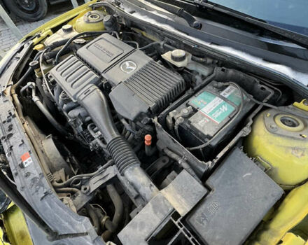 Жовтий Мазда 3, об'ємом двигуна 1.6 л та пробігом 206 тис. км за 4190 $, фото 18 на Automoto.ua