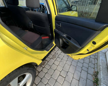 Жовтий Мазда 3, об'ємом двигуна 1.6 л та пробігом 206 тис. км за 4190 $, фото 12 на Automoto.ua