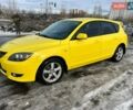 Желтый Мазда 3, объемом двигателя 1.6 л и пробегом 200 тыс. км за 3950 $, фото 1 на Automoto.ua