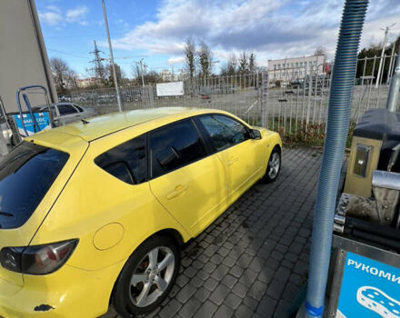 Жовтий Мазда 3, об'ємом двигуна 1.6 л та пробігом 206 тис. км за 4190 $, фото 5 на Automoto.ua