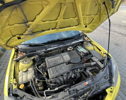 Жовтий Мазда 3, об'ємом двигуна 1.6 л та пробігом 206 тис. км за 4190 $, фото 16 на Automoto.ua