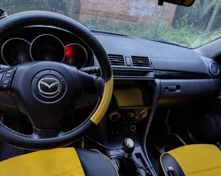 Жовтий Мазда 3, об'ємом двигуна 2 л та пробігом 254 тис. км за 4200 $, фото 7 на Automoto.ua
