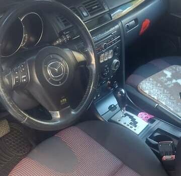 Желтый Мазда 3, объемом двигателя 1.6 л и пробегом 203 тыс. км за 5500 $, фото 6 на Automoto.ua
