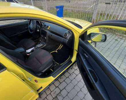 Жовтий Мазда 3, об'ємом двигуна 1.6 л та пробігом 206 тис. км за 4190 $, фото 13 на Automoto.ua