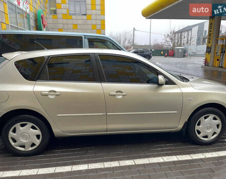 Жовтий Мазда 3, об'ємом двигуна 1.6 л та пробігом 276 тис. км за 4050 $, фото 7 на Automoto.ua
