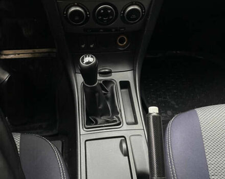 Жовтий Мазда 3, об'ємом двигуна 1.6 л та пробігом 276 тис. км за 4050 $, фото 16 на Automoto.ua