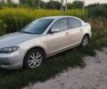 Жовтий Мазда 3, об'ємом двигуна 1.6 л та пробігом 345 тис. км за 3299 $, фото 1 на Automoto.ua