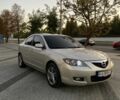 Желтый Мазда 3, объемом двигателя 1.6 л и пробегом 340 тыс. км за 6000 $, фото 1 на Automoto.ua