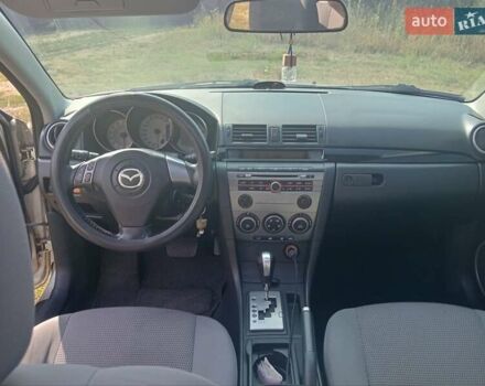 Желтый Мазда 3, объемом двигателя 1.6 л и пробегом 230 тыс. км за 4700 $, фото 5 на Automoto.ua