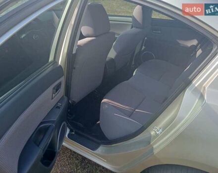 Желтый Мазда 3, объемом двигателя 1.6 л и пробегом 230 тыс. км за 4700 $, фото 1 на Automoto.ua