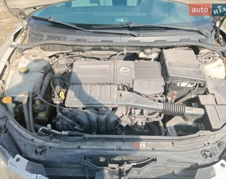 Желтый Мазда 3, объемом двигателя 1.6 л и пробегом 230 тыс. км за 4700 $, фото 9 на Automoto.ua